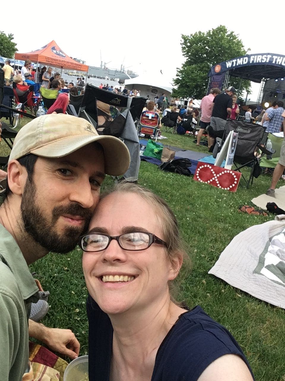 Laura and Nik enjoying an outdoor concert at Canton Waterfront Park